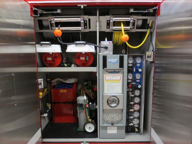Drivers side compartment (D4) houses the SCBA fill station, low pressure air reel, electrical reel with junction box, two portable quart lights, two portable cord reels with quartz lights, miscellaneous electrical adaptors, cutting torch and a Arc Air Cutter