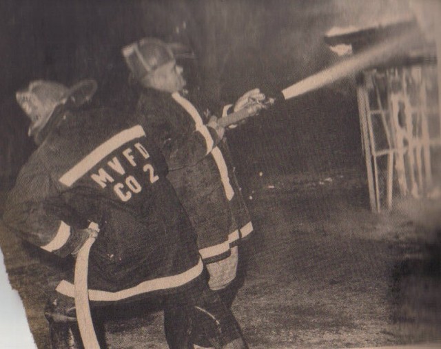 Firefighters Bill Simpson and Henry Fowler on the 1.5&quot; with their &quot;Tin Pots&quot; on backwards to protect from the heat