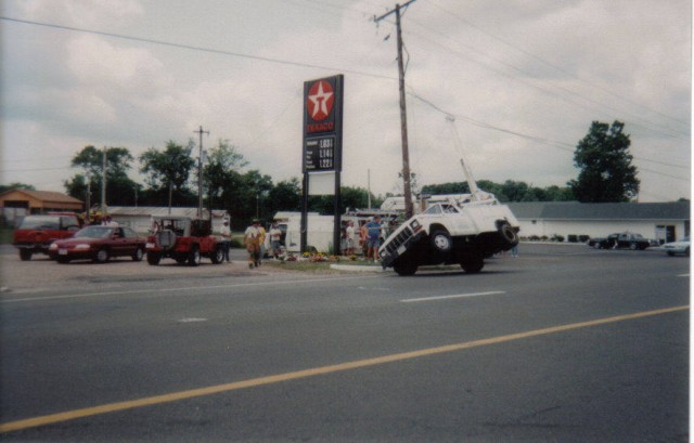 This incident happened on Rt.5 at Hills Club Road when the boom wasn't secured and decided to raise itself, catching the utility lines above