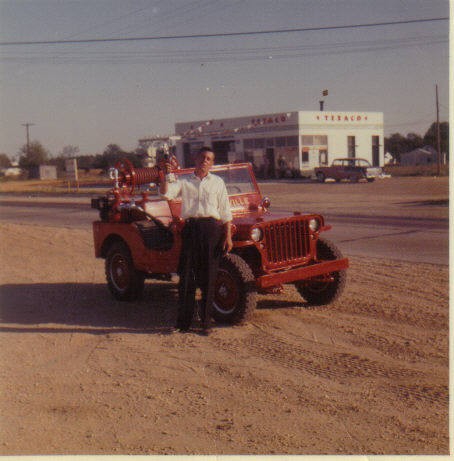 John Montgomery stands in front of Jeep-2
