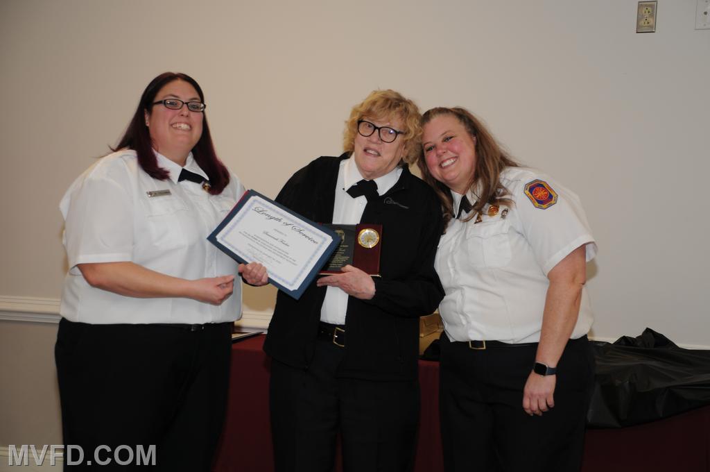 Auxiliary presenting Susannah Fowler with a certificate for 50 years of service.