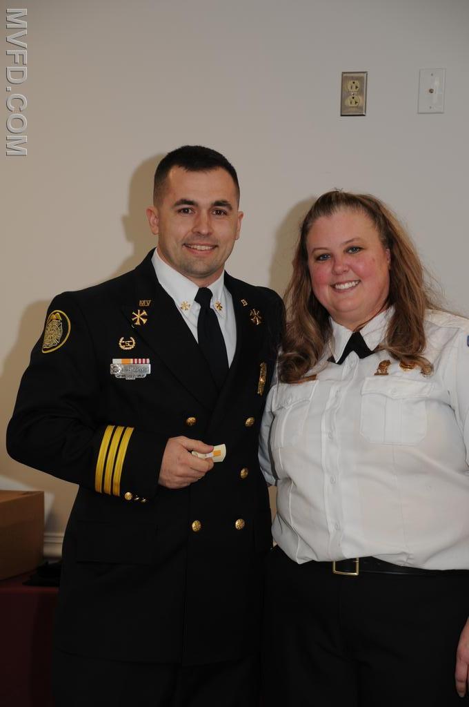 Auxiliary President Molly Colonna presenting Tyler Burroughs with the Operational Member of the Year pin.