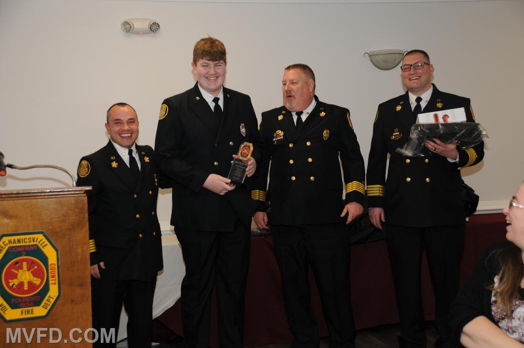 Chief Trowbridge, 2023 Asst. Chief John Raley, 2023 Deputy Chief Ryan Raley presents Cooper Hedrick with the Cadet of the Year award.