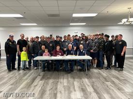 Members witness contract signing for new Tanker 