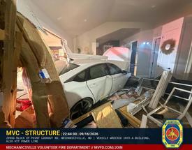 Vehicle Strikes Building on Point Lookout Road