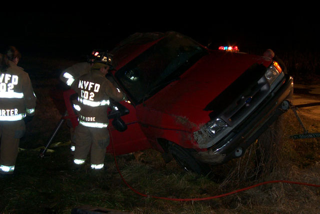 Another shot of the crew removing the passenger side door