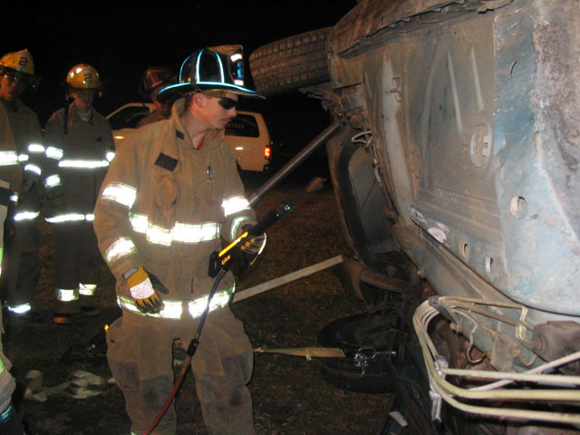Firefighter Barnes about to use the air chisel