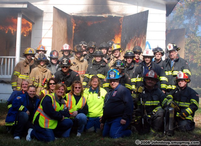 Personnel pose in front of the structure after all training evolutions were completed